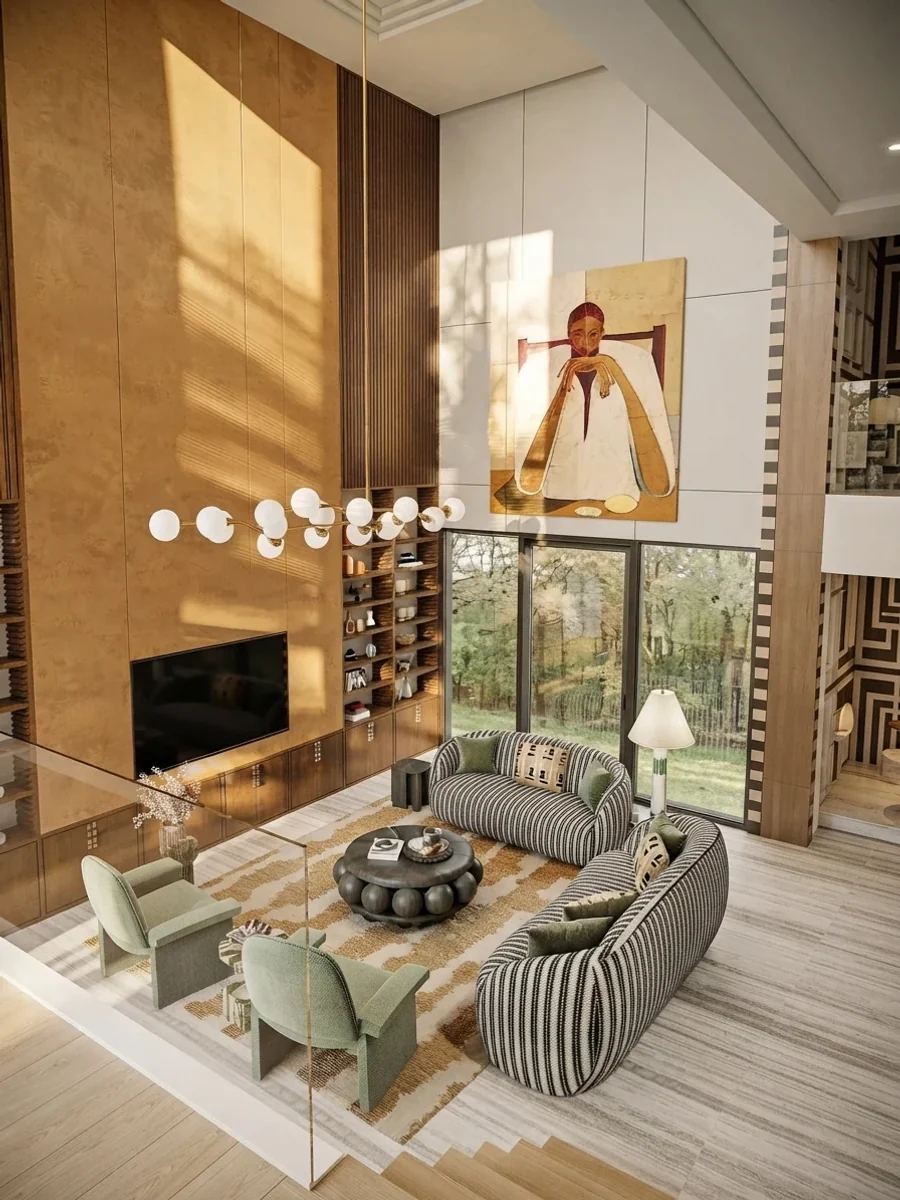 Double height living room seen from the mezzanine, with a warm ochre panelled wall, two striped curved sofas and one tall figure painting hung high on the white wall above full-height glass doors