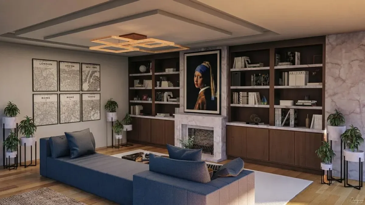 Home library with walnut shelving on both sides of a marble fireplace, a navy sectional sofa and one portrait of a girl with a pearl earring centred on the chimney breast above the mantel